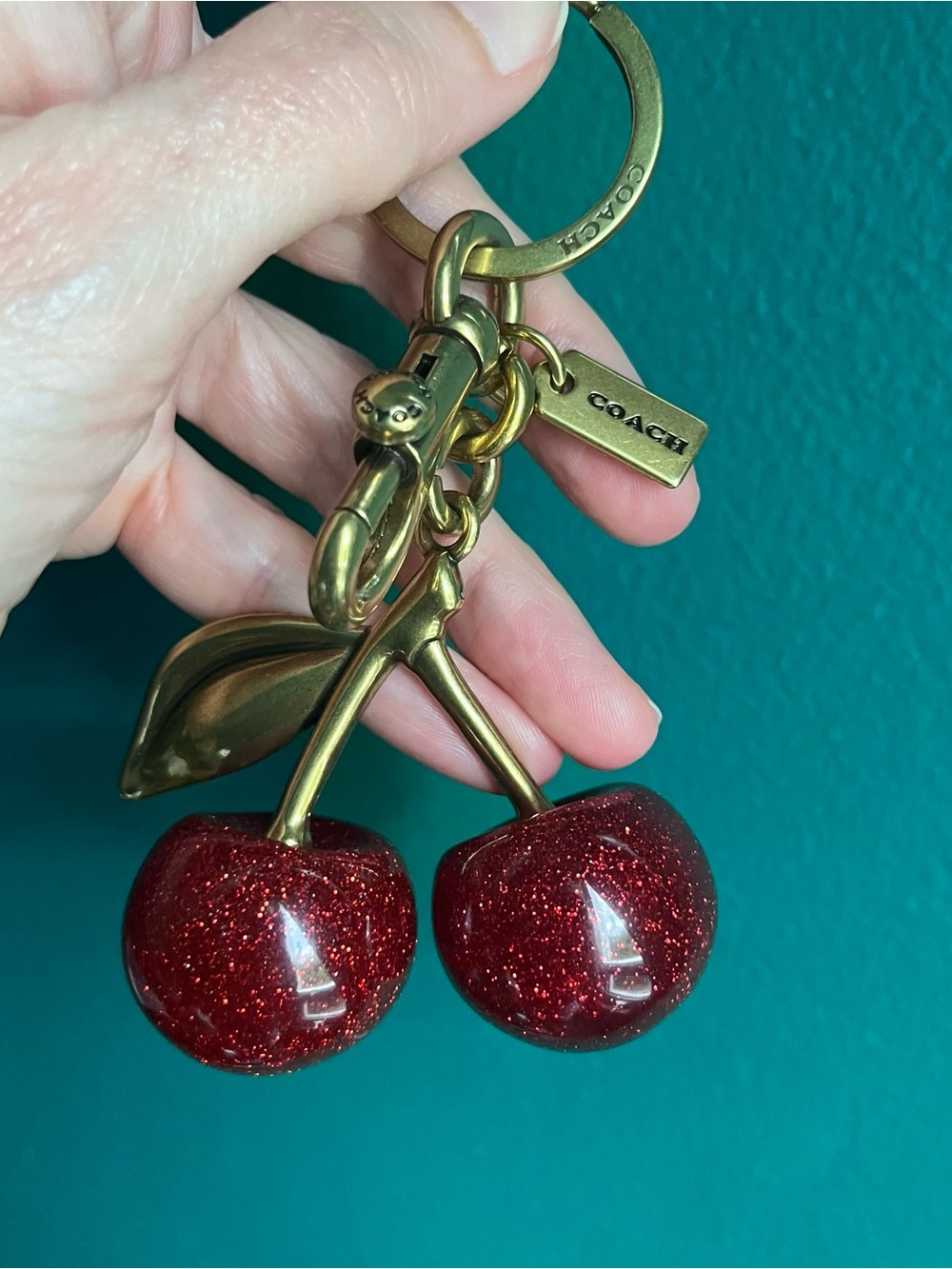 COACH Gold-Tone Cherry Keychain with Sparkling Red  Excellent Replica